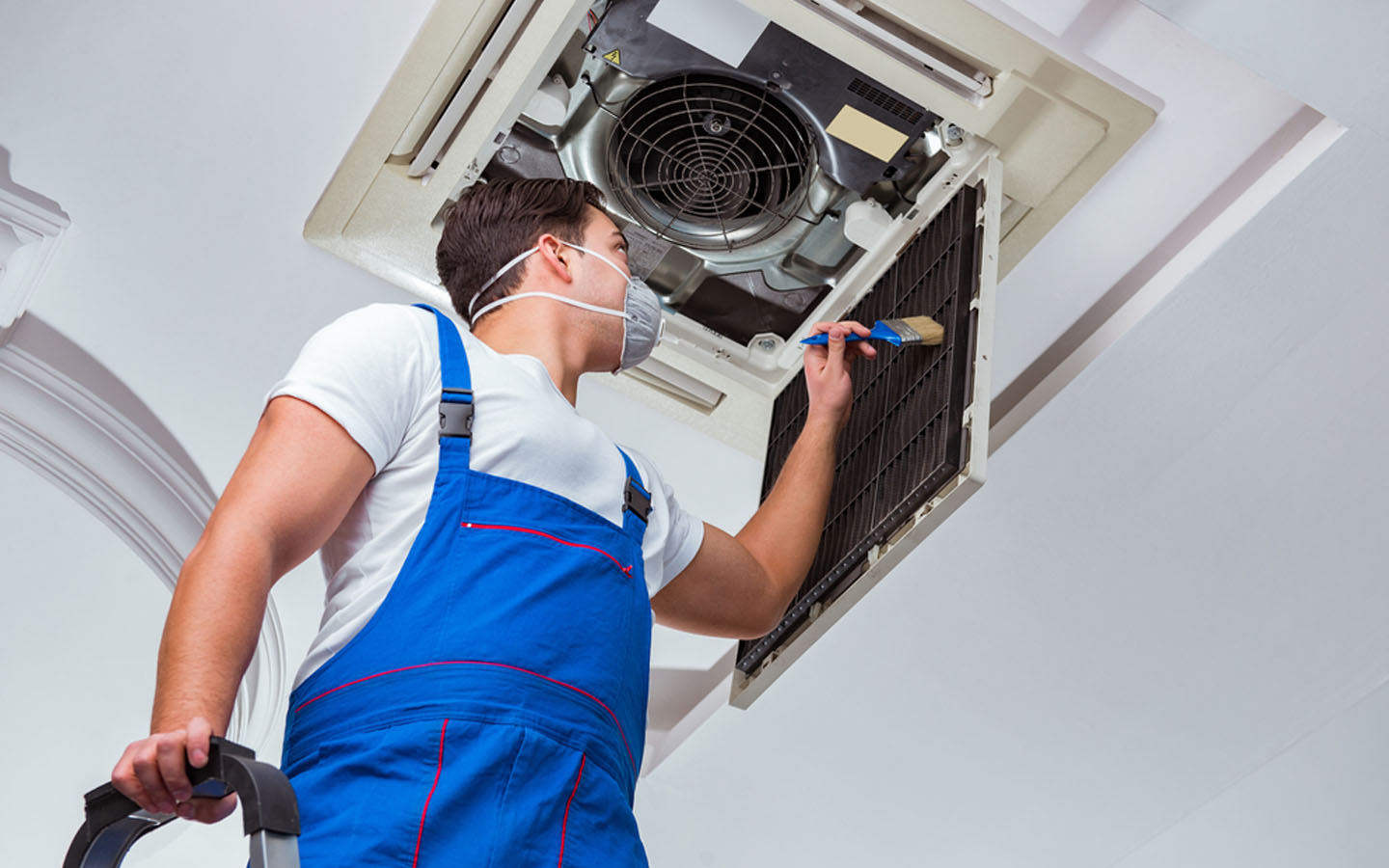 man-repairing-air-conditioner